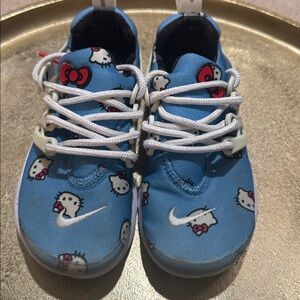 Blue Hello Kitty Nike Presto Sneakers with White Laces
Final Sale.